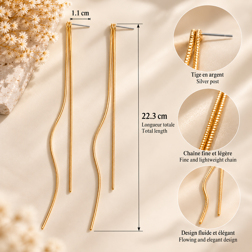 Boucles d’oreilles longues dorées à double chaîne sur pierre beige